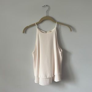 this is a cute sleeveless blouse worn once